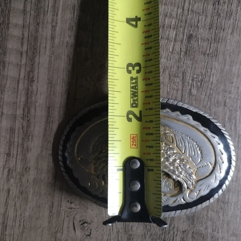 Silver/gold tone oval Eagle Belt Buckle. Made in USA